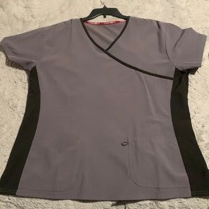 Gray and black women’s scrub shirt, size 2X the brand is divine stretch.
